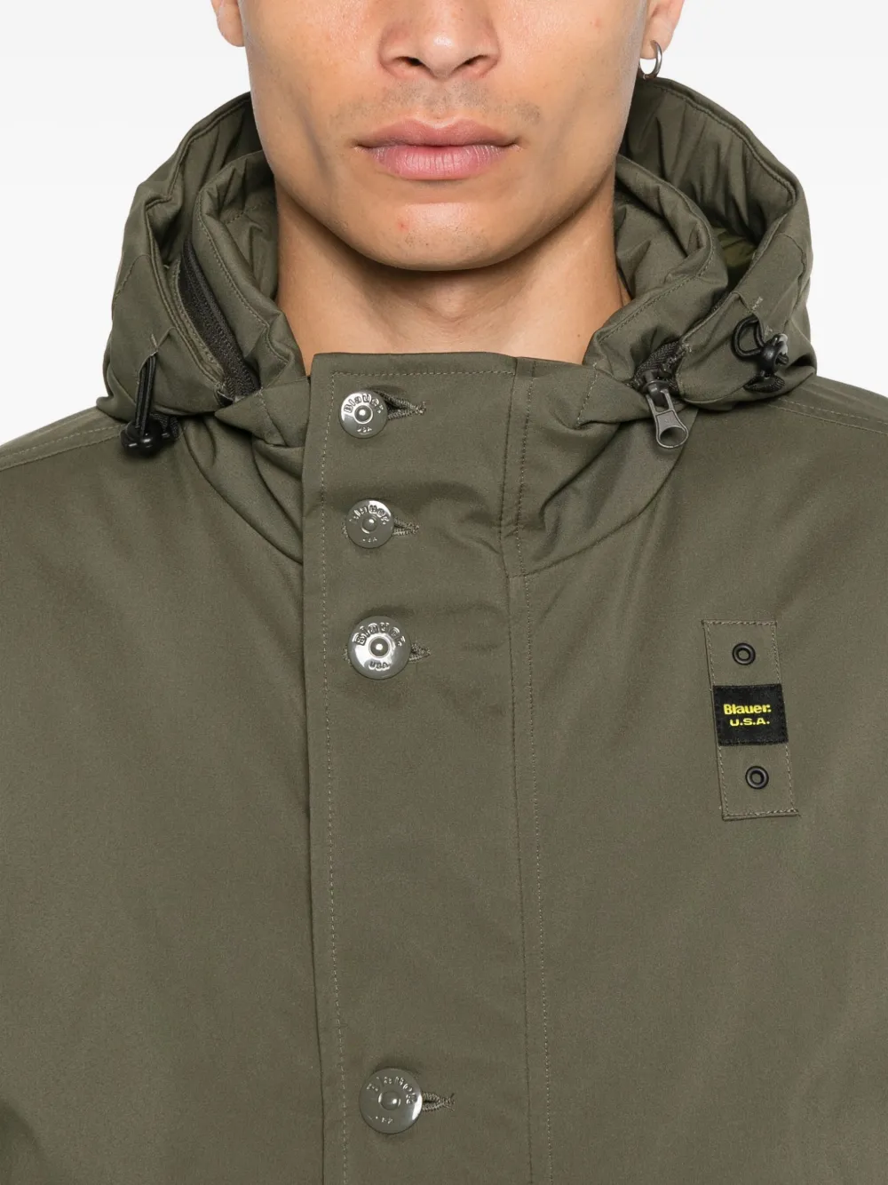Blauer Jack met capuchon en knoopsluiting Groen