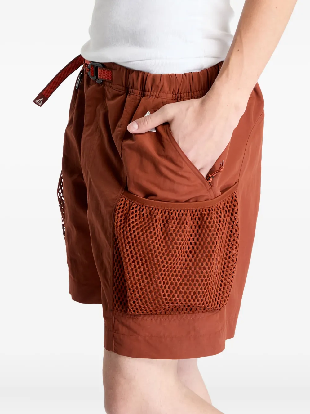 Nike Cargo shorts met mesh zak Bruin