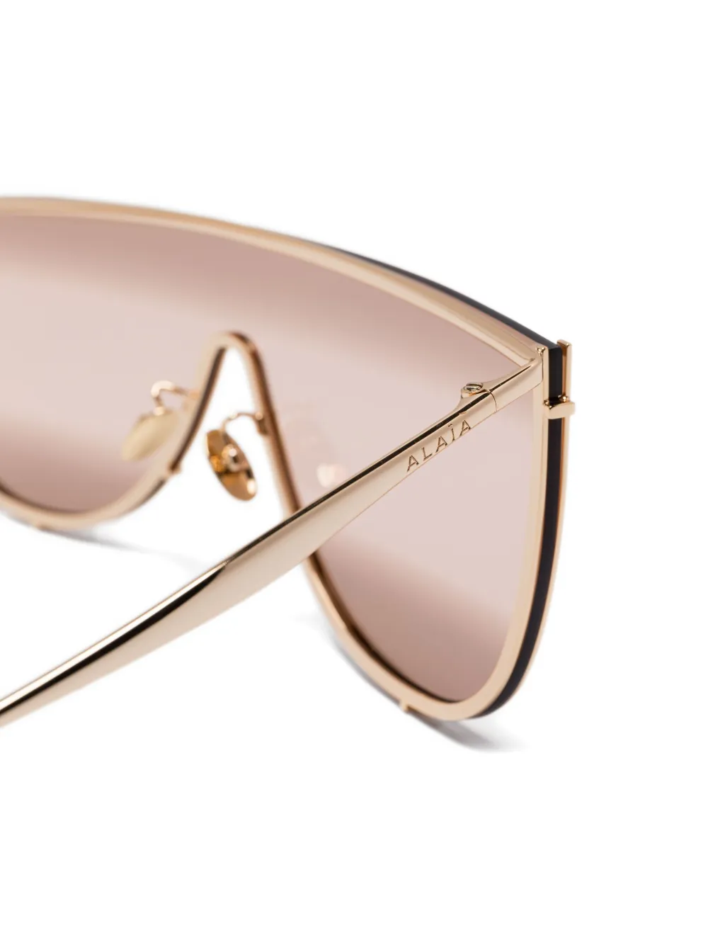 Alaia Eyewear Zonnebril met schild montuur Geel