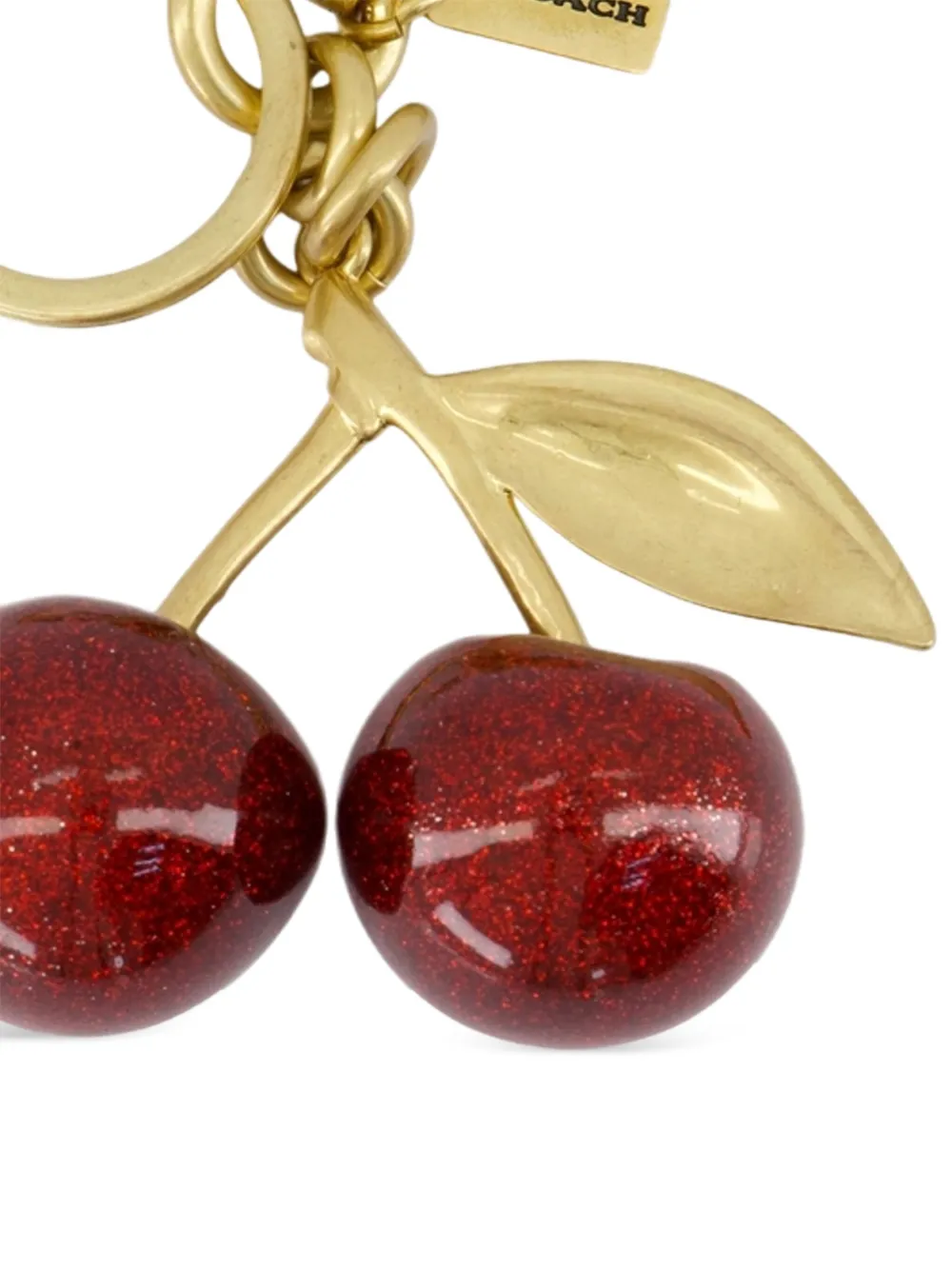 Coach Cherry sleutelhanger met glitter Goud