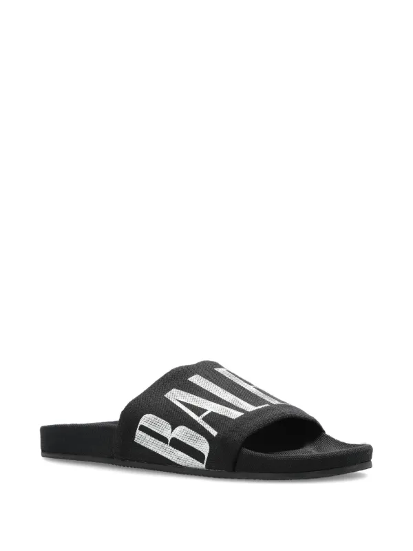 Balenciaga logo-print Slides | Black | FARFETCH