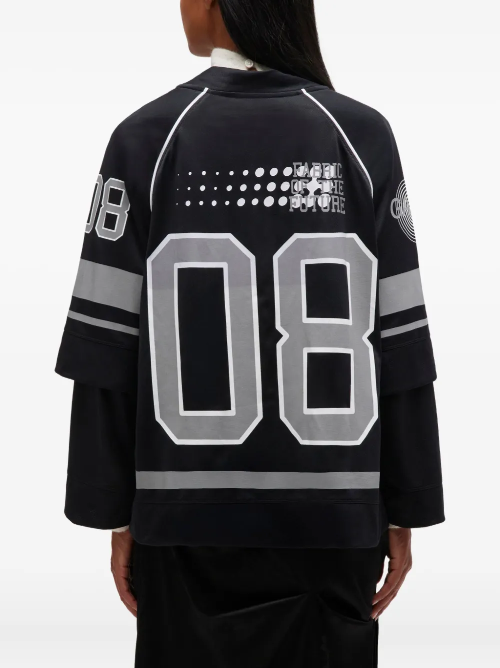 GANNI Jersey top met gehaakte bloem Zwart