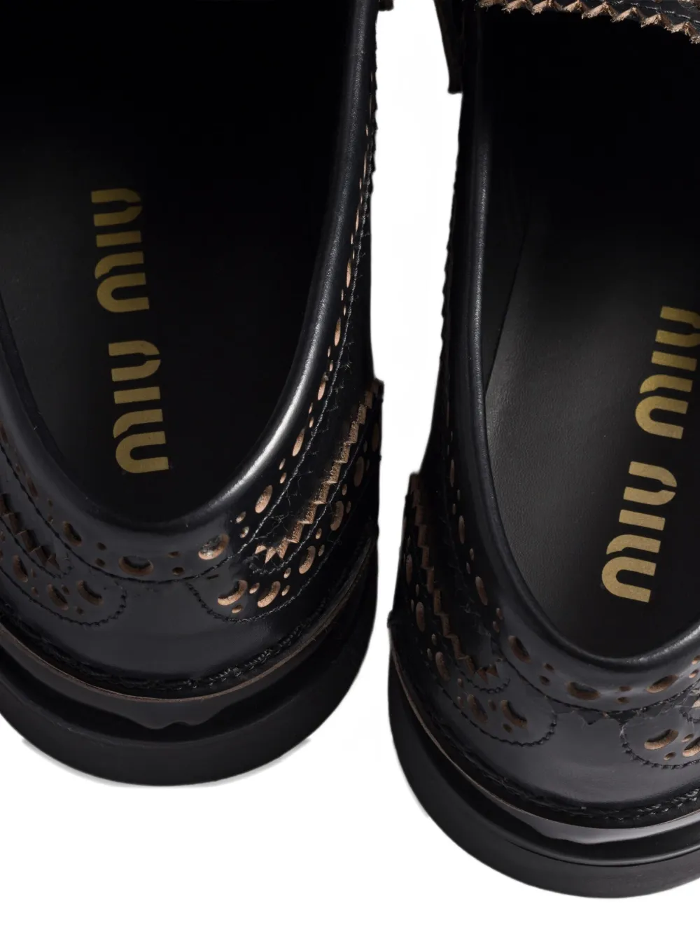 Miu perforated coin-detail loafers Black