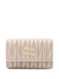 Miu Miu Pre-Owned 2020s matelasse leather key case - Neutrals