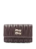 Miu Miu Pre-Owned 2020s matelasse leather key case - Brown
