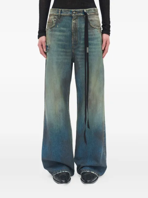 Ann Demeulemeester jeans con detalles deshilachados