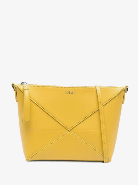 Puzzle leather clutch bag