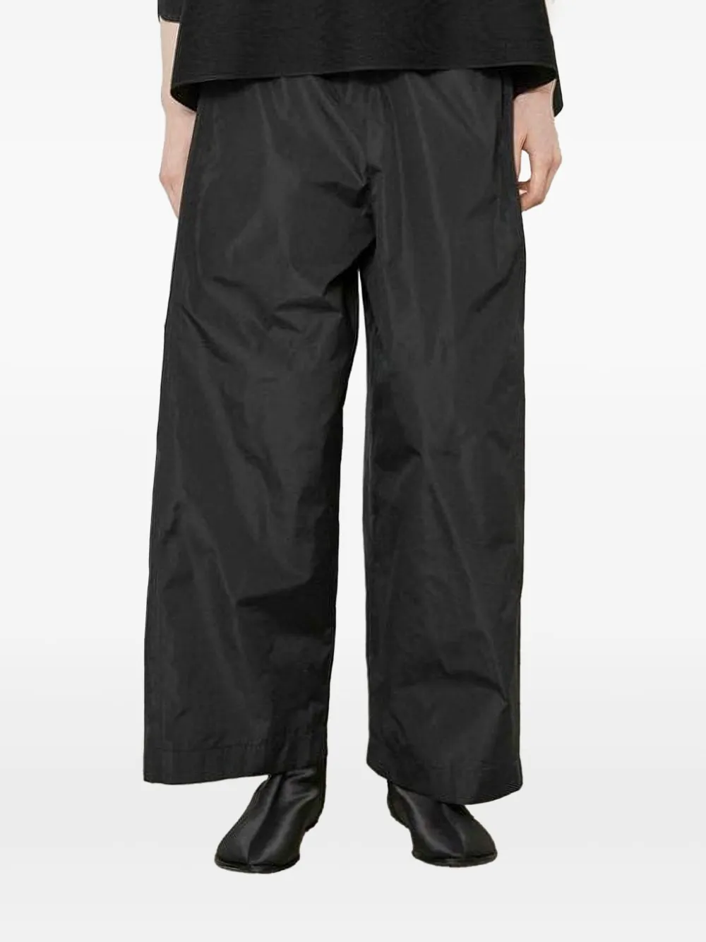 MeimeiJ pleated-panel trousers | Black | Image 1