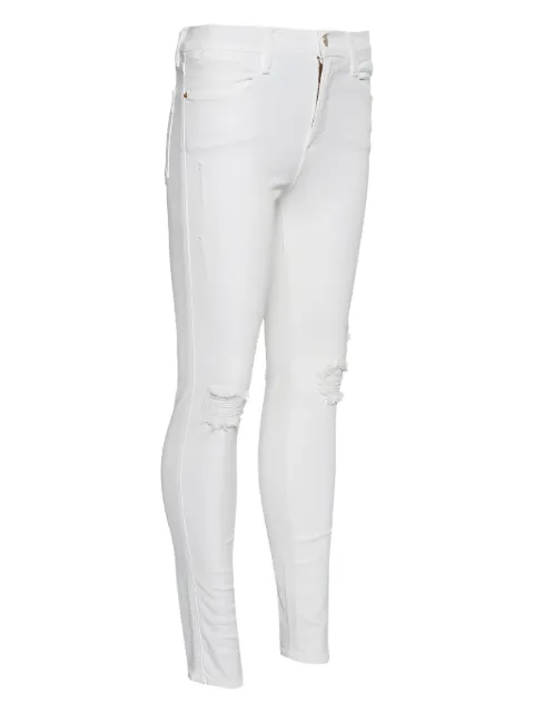 FRAME skinny jeans con efecto envejecido