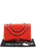 CHANEL Pre-Owned Chevron patent leather bag - Orange