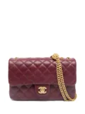 CHANEL Pre-Owned 2024 medium Camellia Crush leather Flap shoulder bag - Red