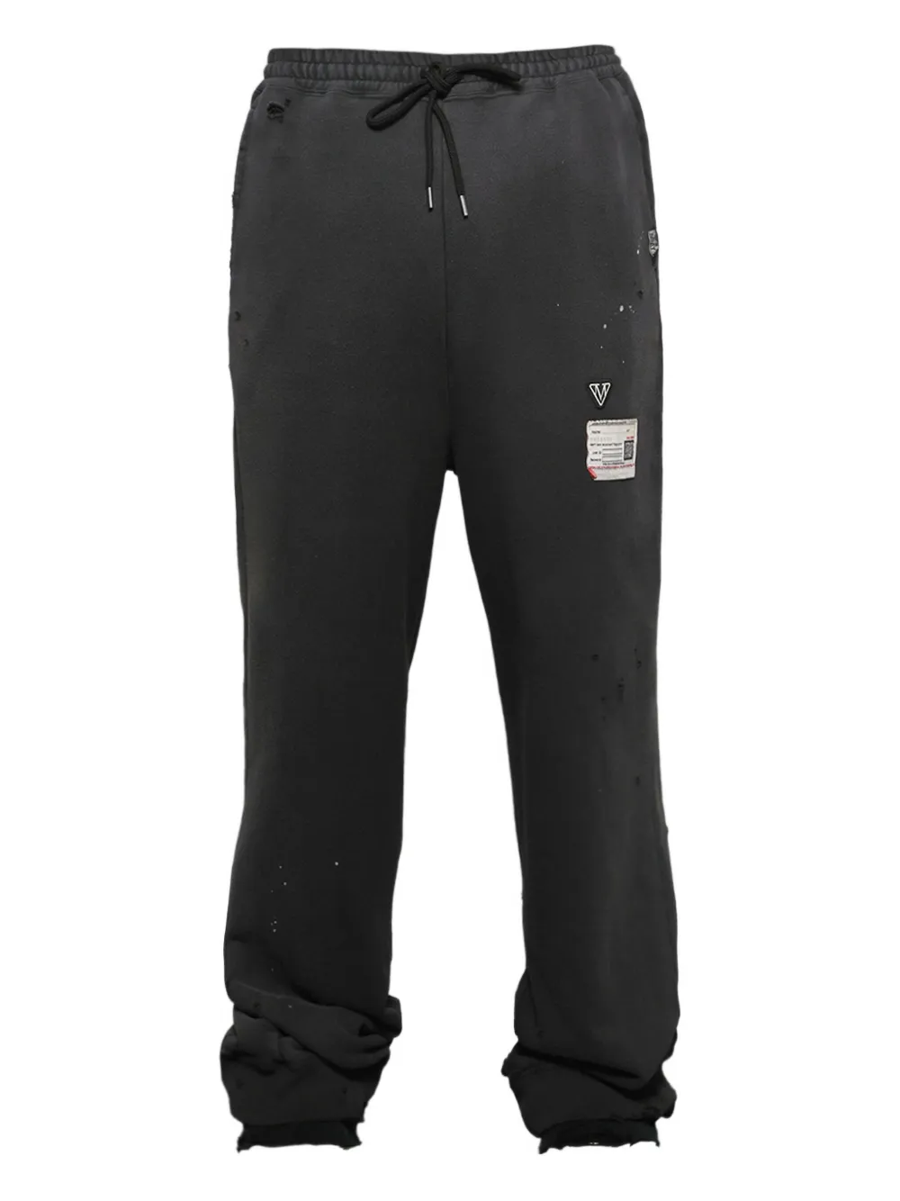Maison MIHARA YASUHIRO distressed track pants | Black | Image 1