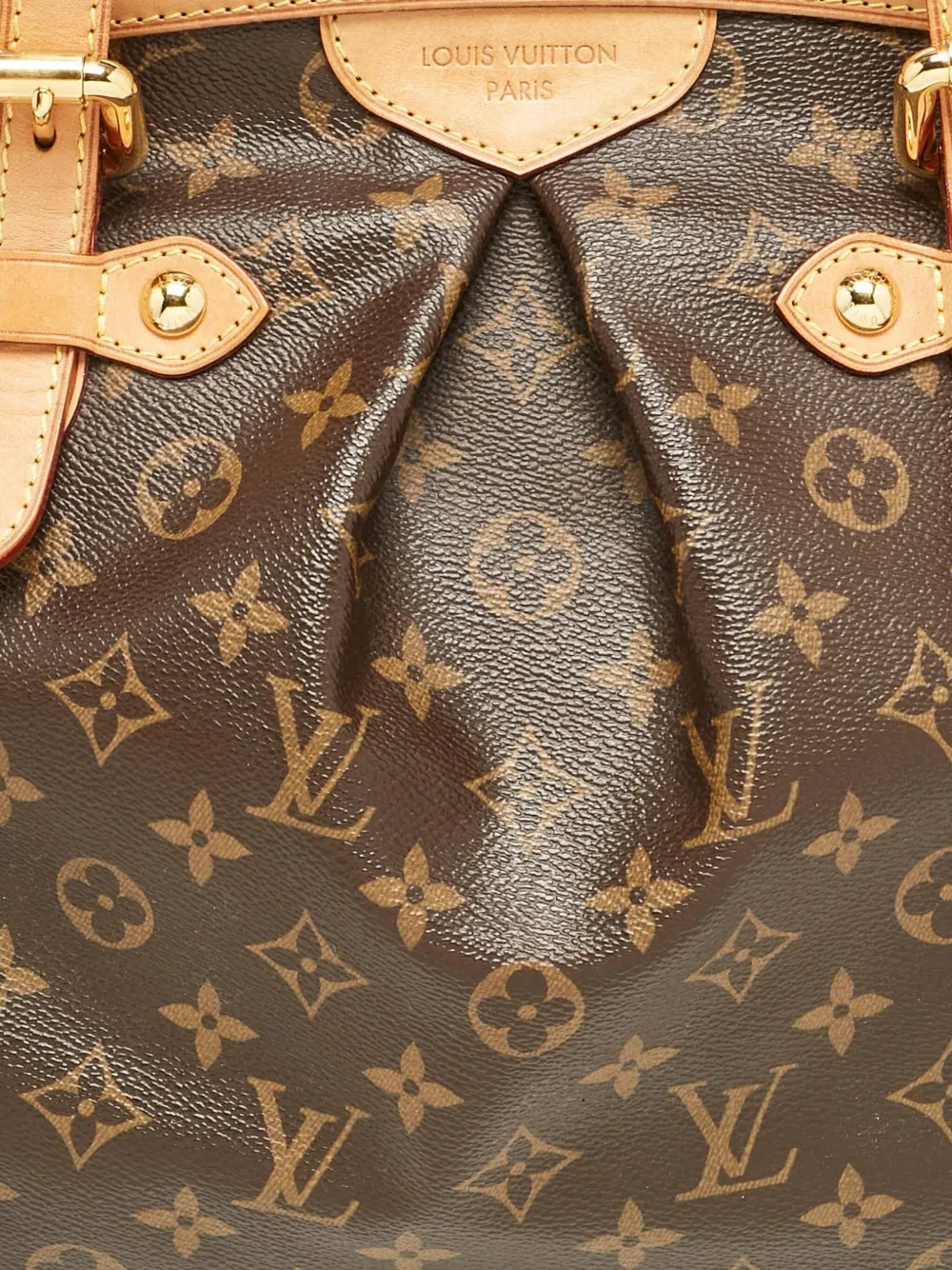 Pre-owned Louis Vuitton Tivoli Monogram Handbag In Brown