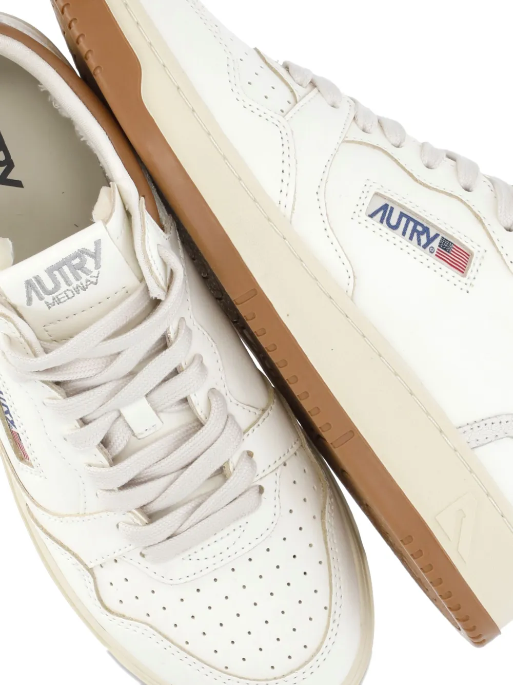Autry Perforated Platform Leather Sneakers In White
