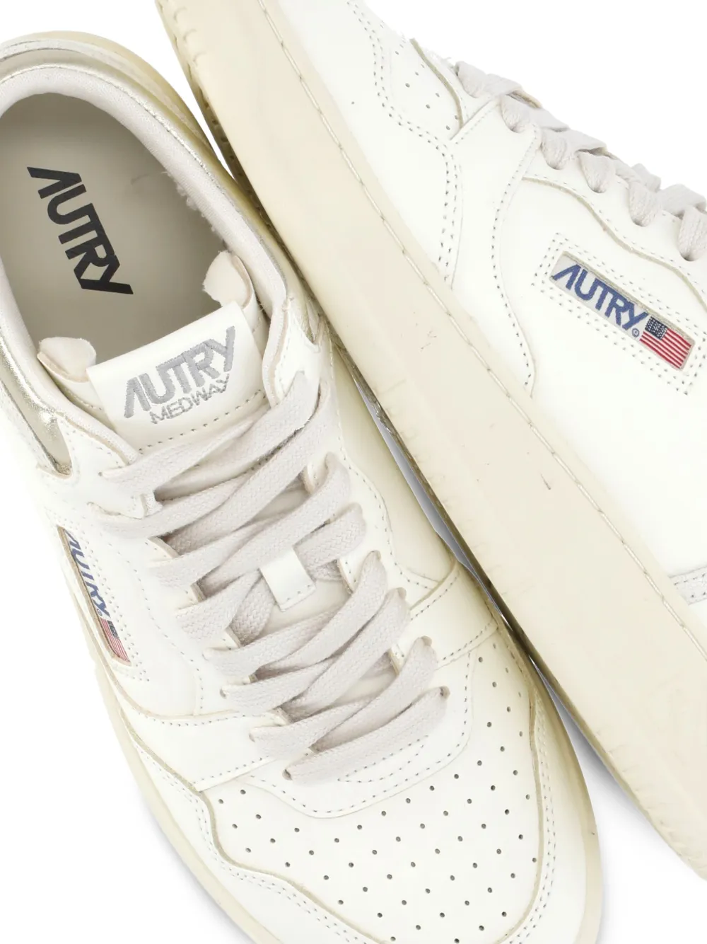 Autry perforated platform leather sneakers White