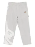 AAPE BY *A BATHING APE® logo-patch trousers - Grey