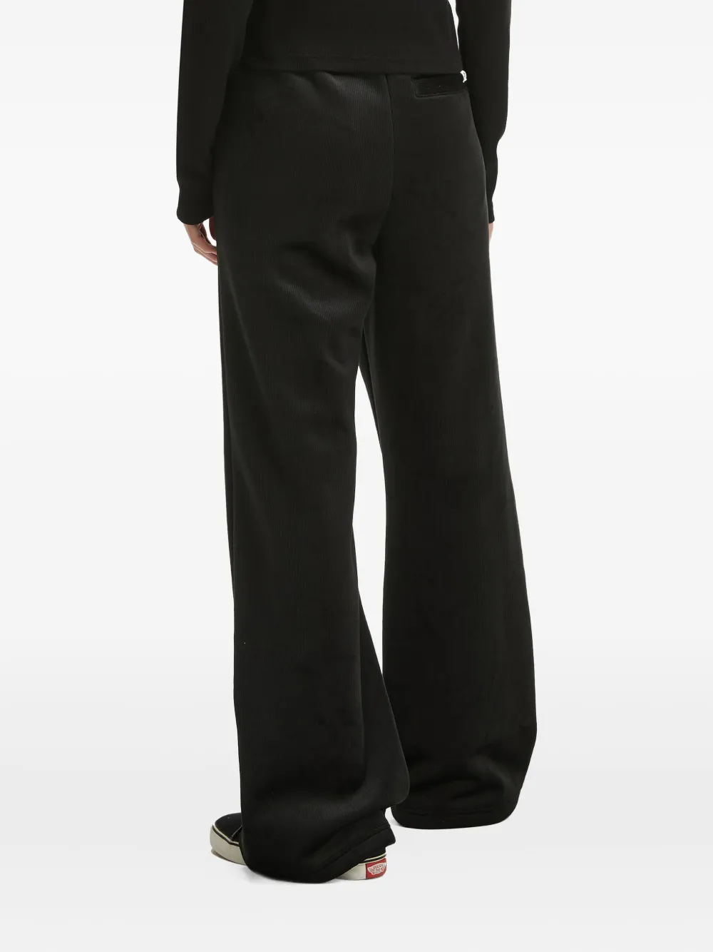 Chocoolate Heart-emblem Ribbed Trousers In Black