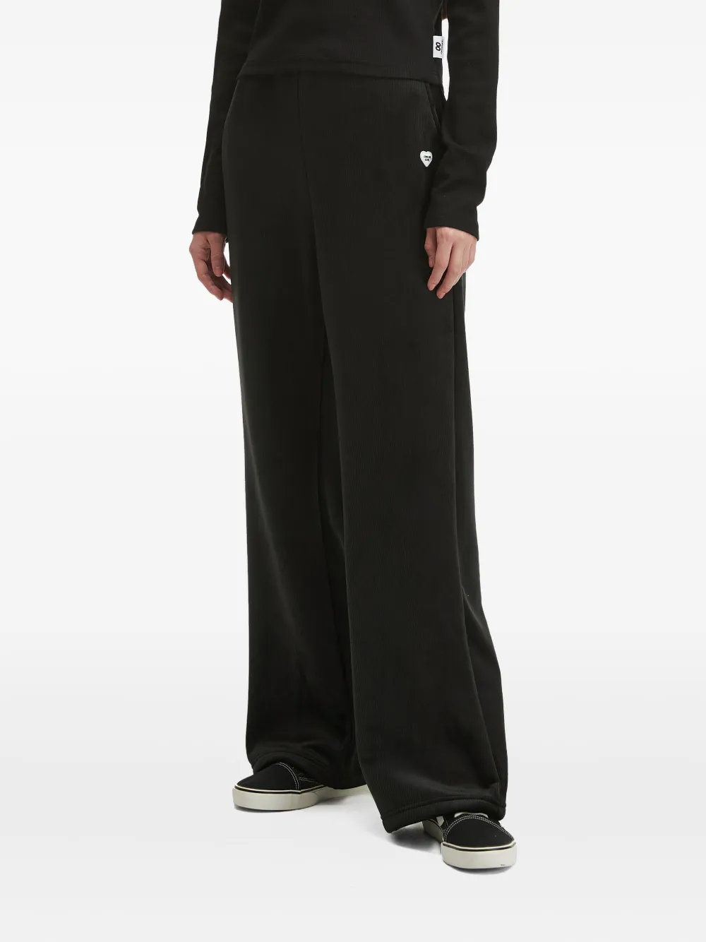 Chocoolate Heart-emblem Ribbed Trousers In Black