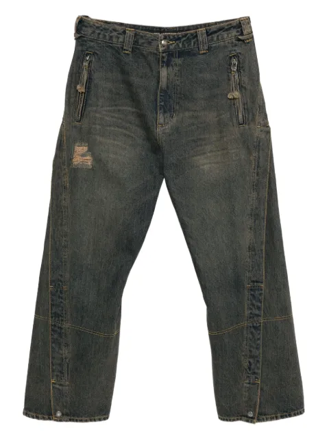 Andersson Bell twisted zipped-pockets jeans