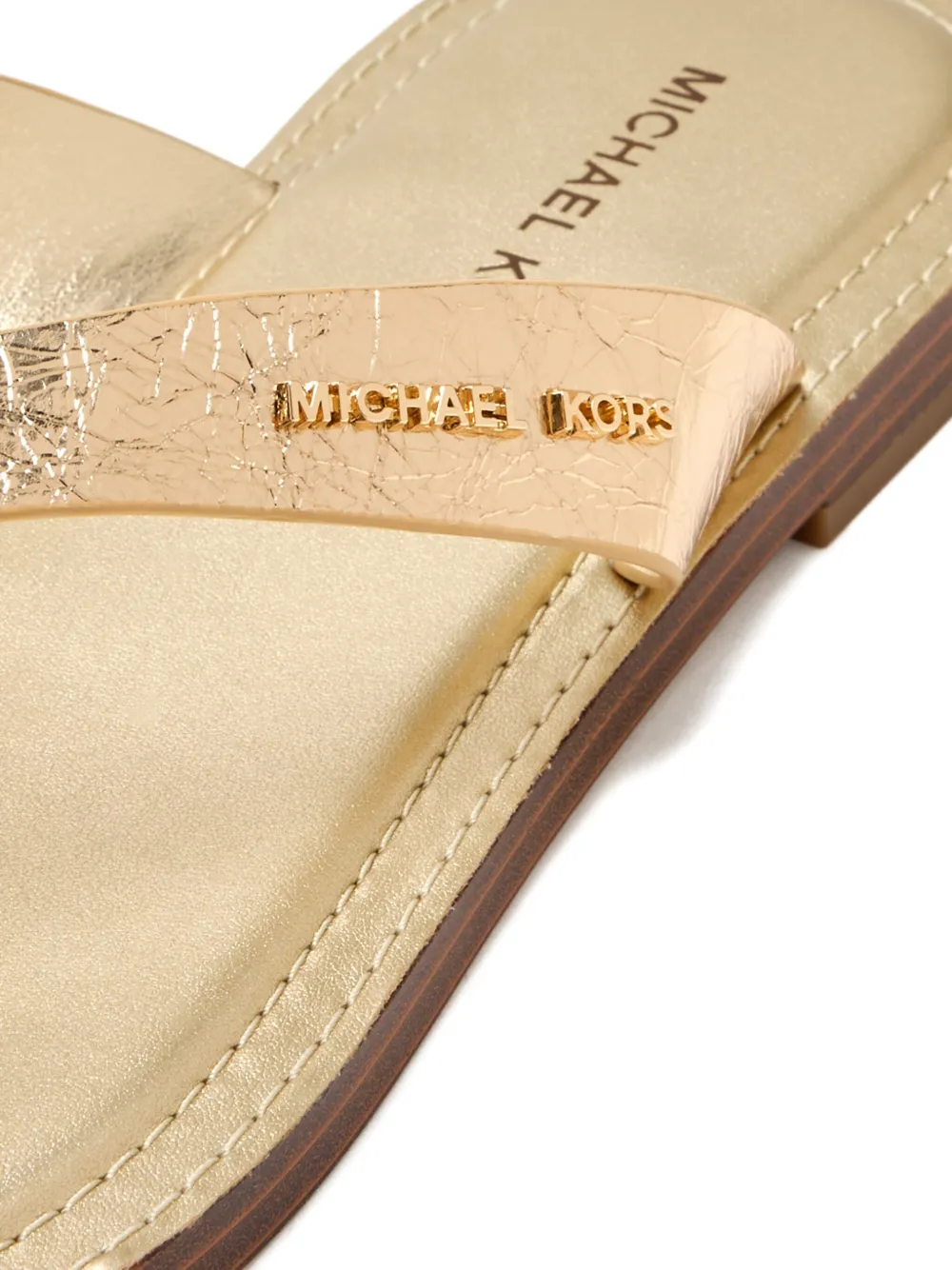 Michael Kors Koko metallic leren teenslippers Bruin