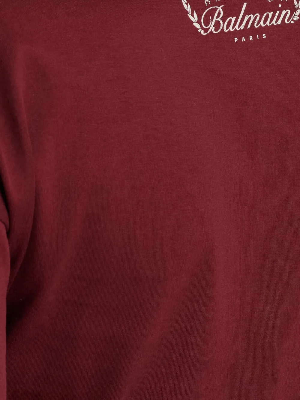 Balmain Twisted Button-embellished Top In Red