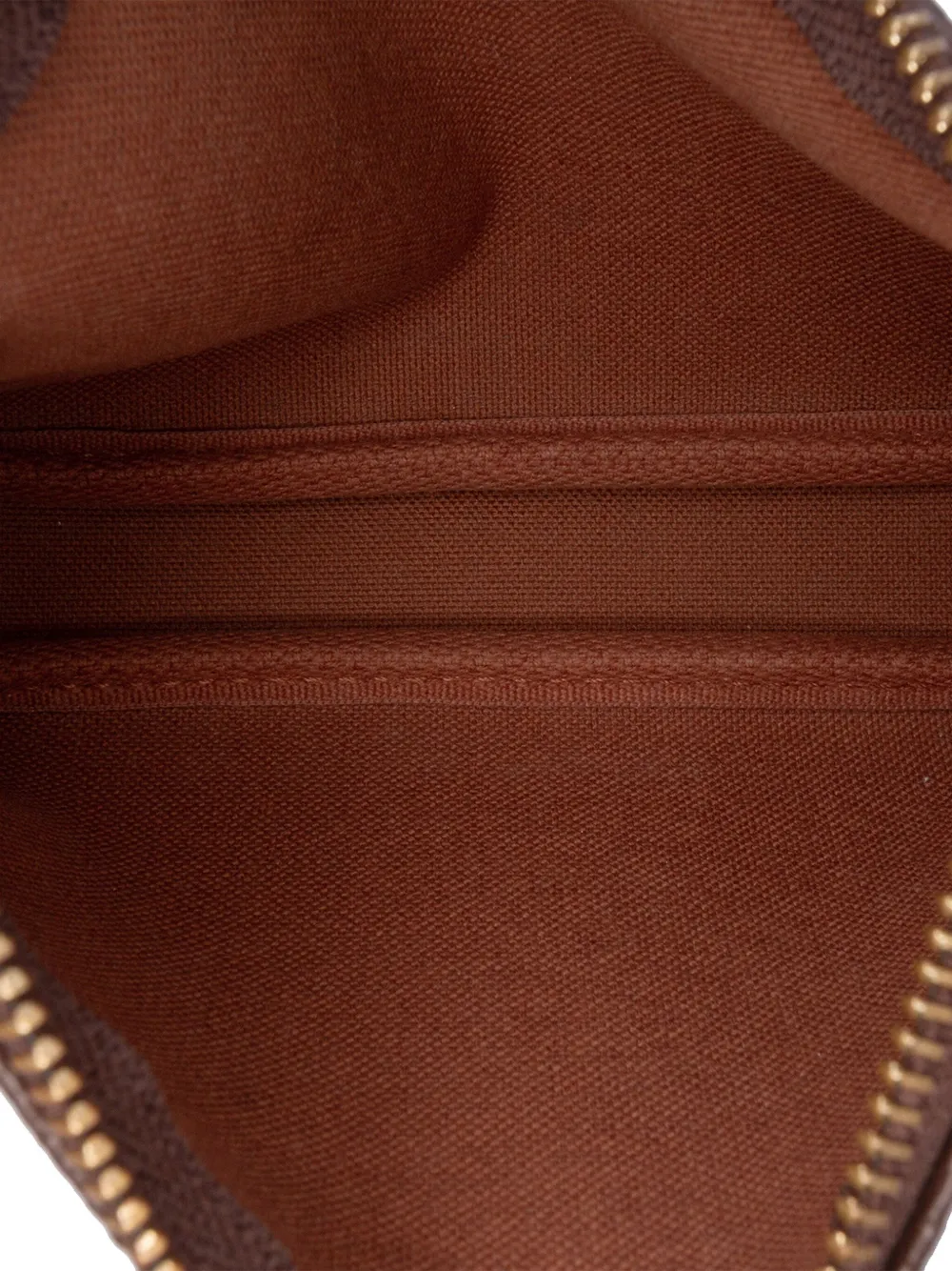 Pre-owned Louis Vuitton 2017 Monogram Giraffe Christmas Mini Pochette Accessoires Handbag In Brown