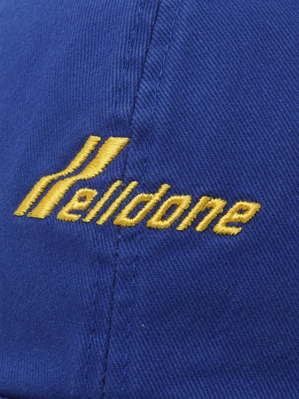 We11done embroidered-logo paint-splatter cap Blauw