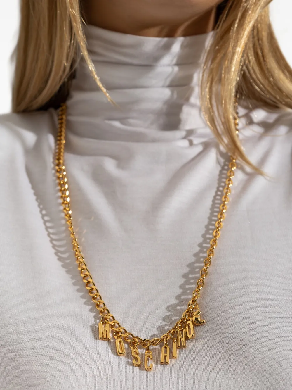 Moschino Halsketting met schakels en logo - Goud