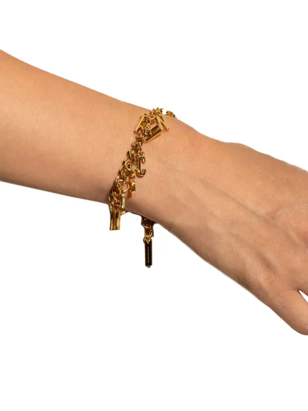 Moschino lettering-charm Bracelet | Gold | FARFETCH GE