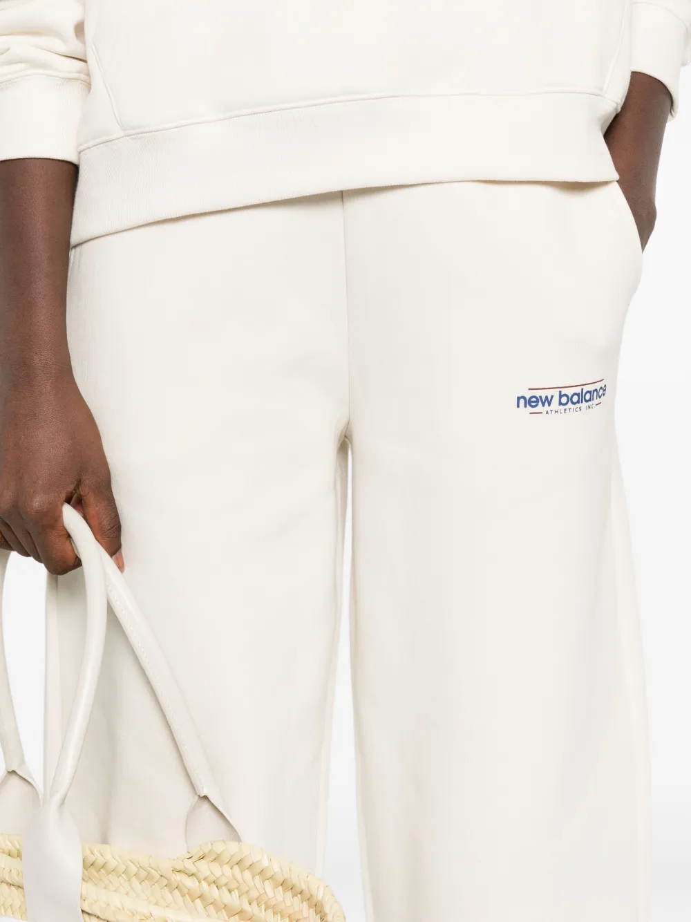 New Balance Joggingbroek met logo Beige