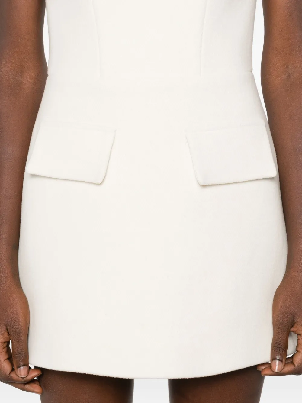 Vestiaire d'un Oiseau Libre Wollen mini-jurk met zak Beige