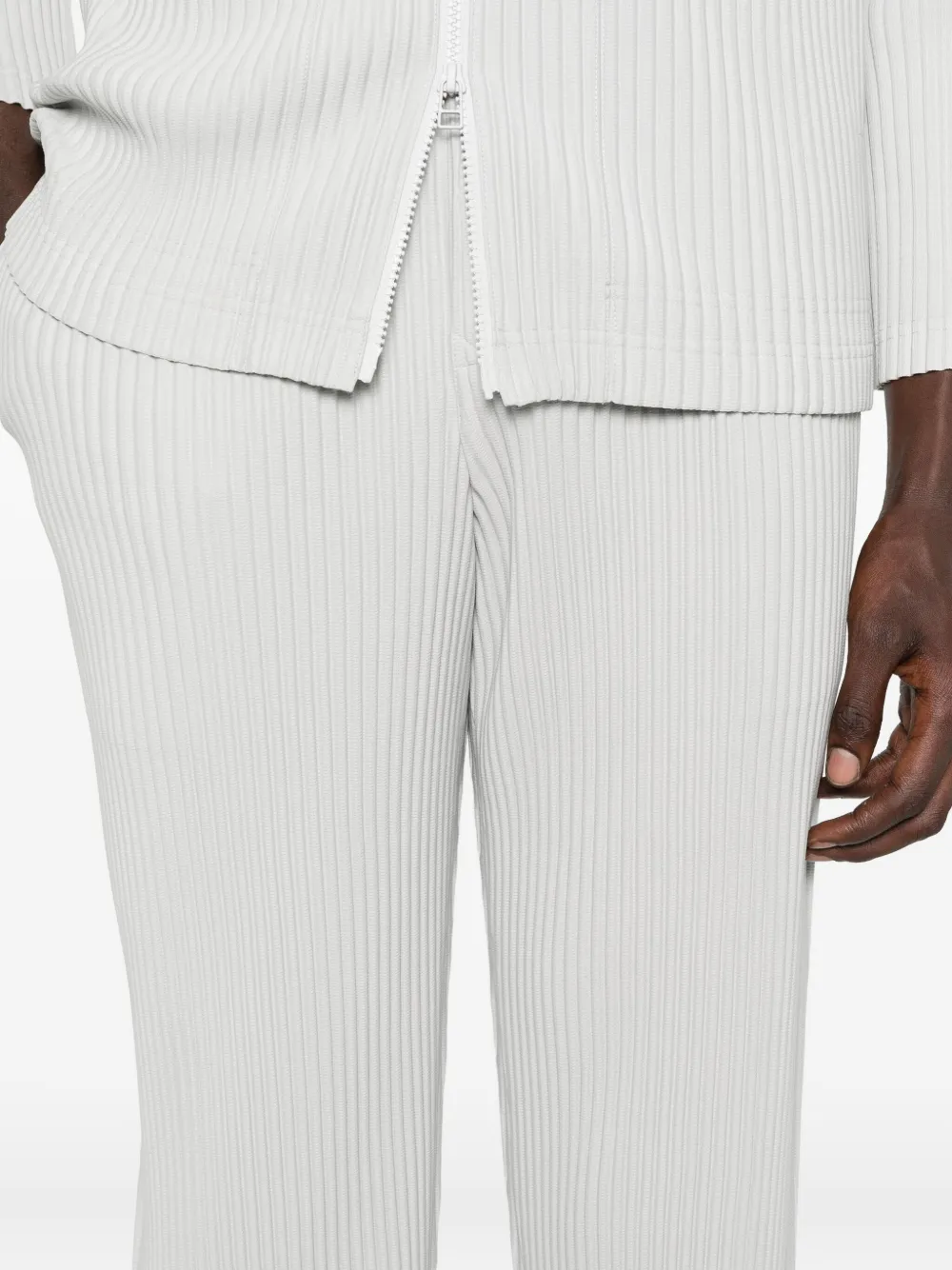 Homme Plissé Issey Miyake Plissé elastische broek Grijs