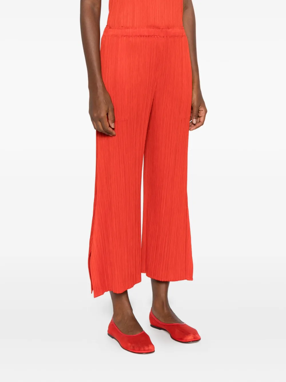 Pleats Please Issey Miyake Plissé elastische broek Rood