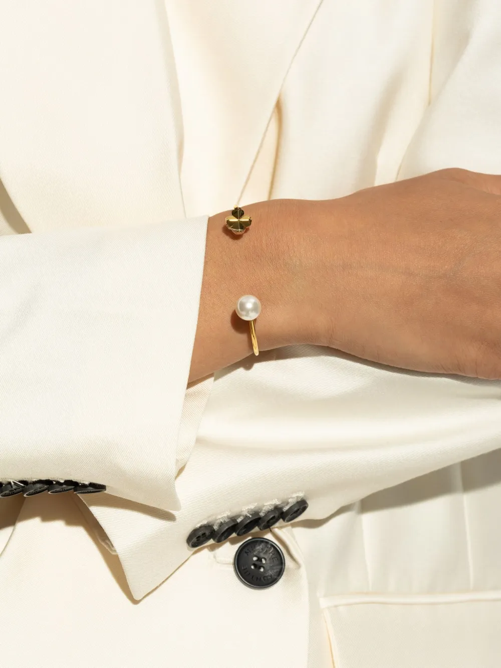 Kate Spade Armband verfraaid met parel en klaverpatroon - Goud