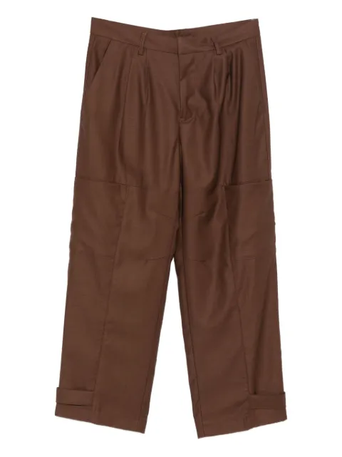 Costumein pantalones a paneles