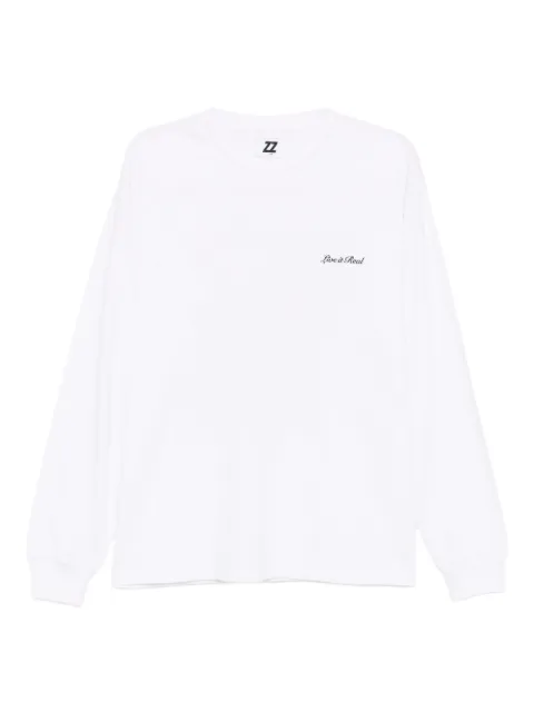 izzue playera con eslogan bordado