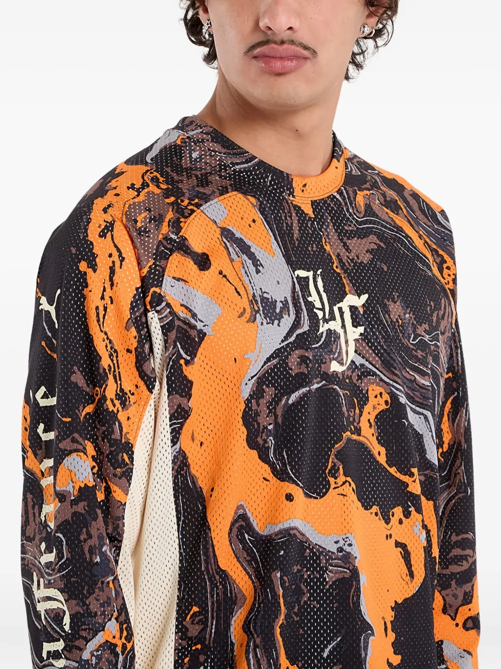 PUMA Lafrancé mesh jersey met marmerprint Oranje