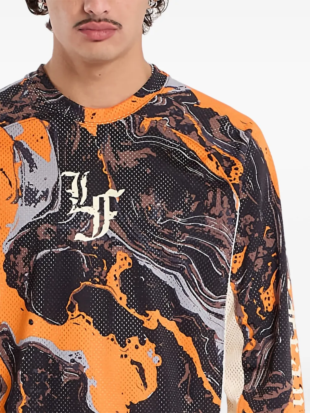 PUMA Lafrancé mesh jersey met marmerprint Oranje