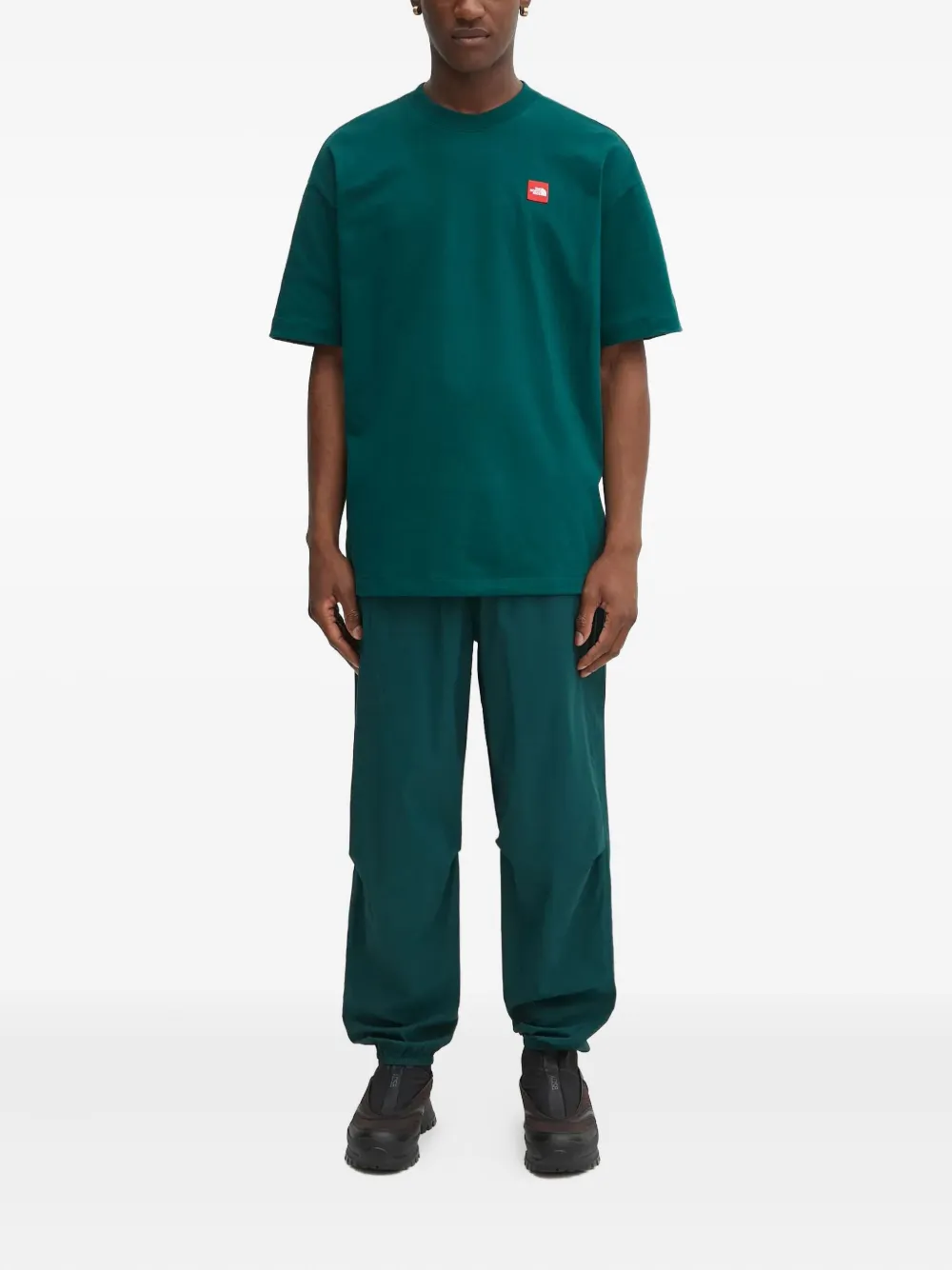 The North Face Elastische broek met ritszak - Groen