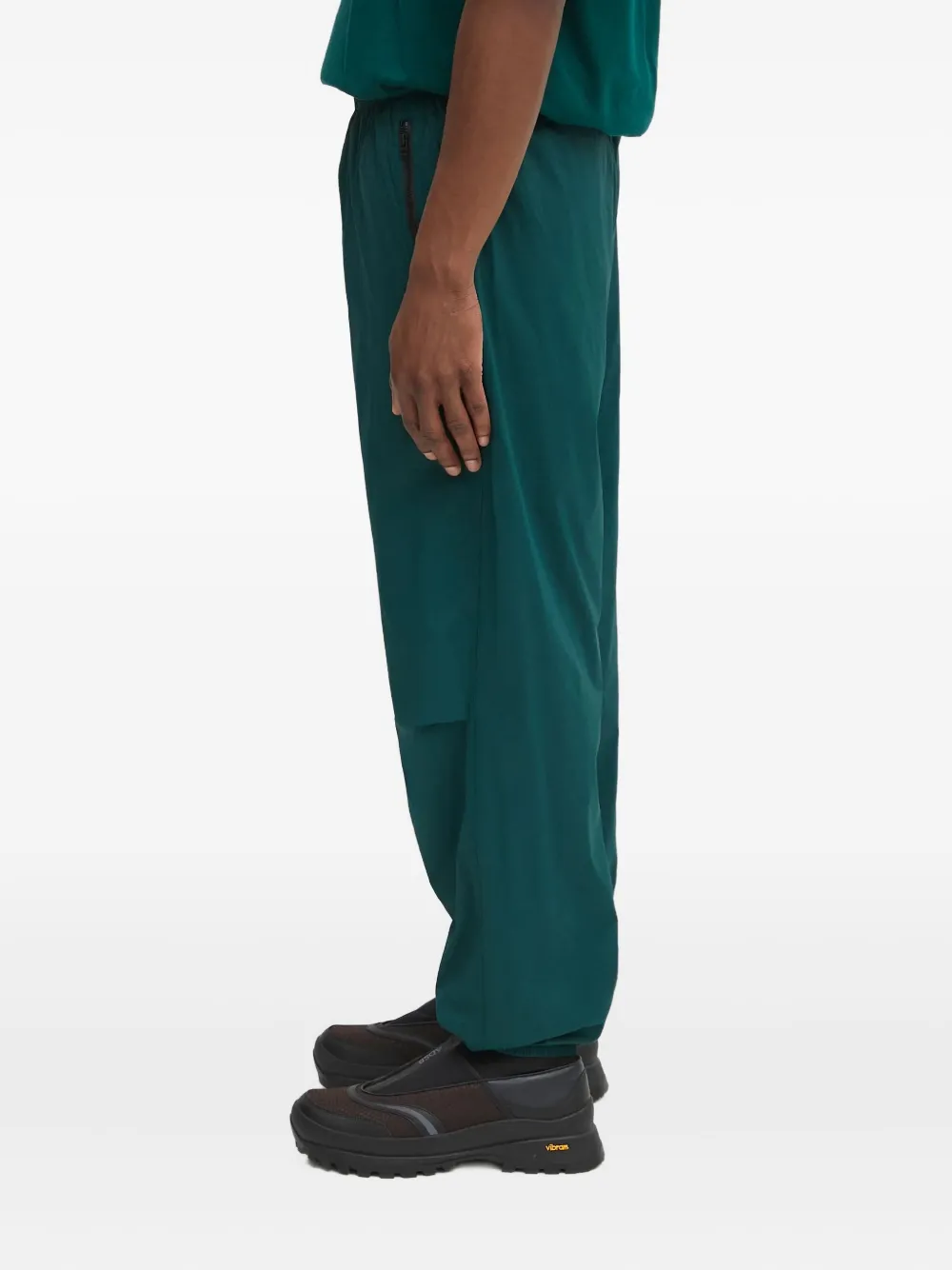 The North Face Elastische broek met ritszak Groen