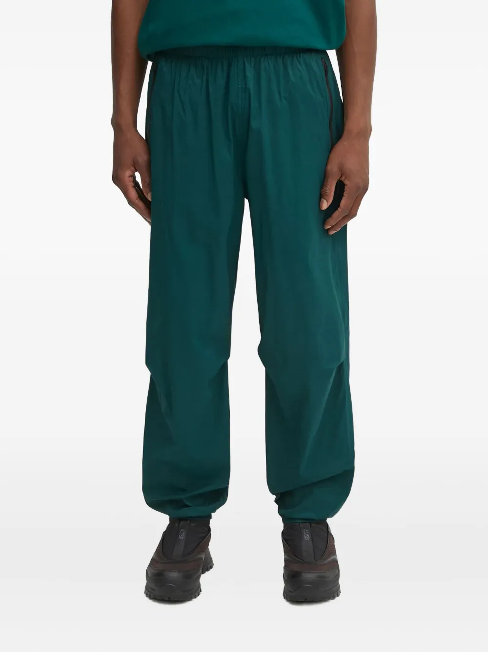 The North Face Elastische broek met ritszak Groen