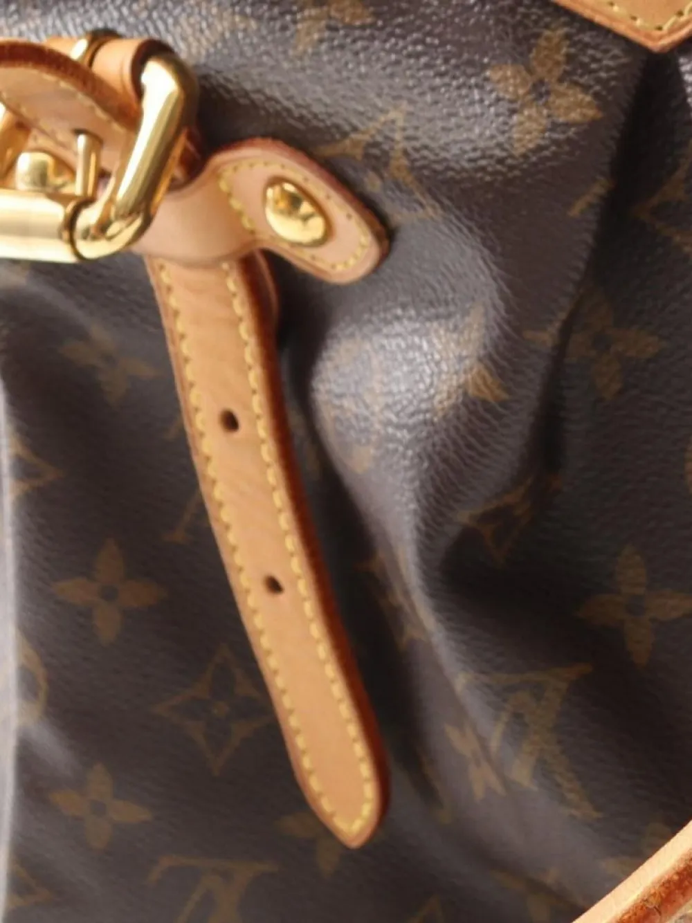 Pre-owned Louis Vuitton 2011 Tivoli Gm Monogram Tote Bag In Brown