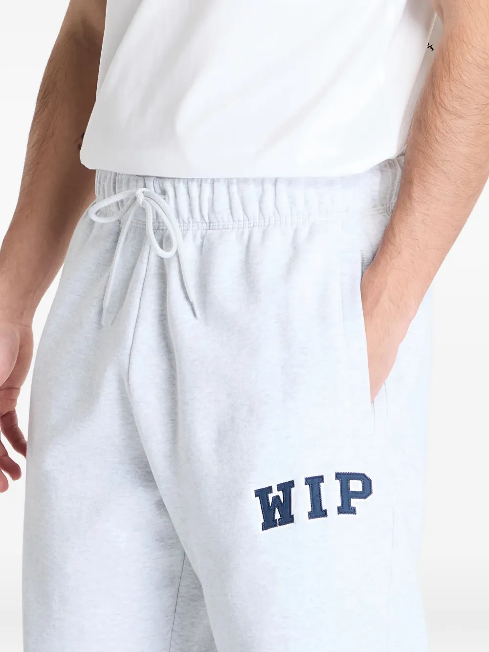 Carhartt WIP logo-patch track pants Wit