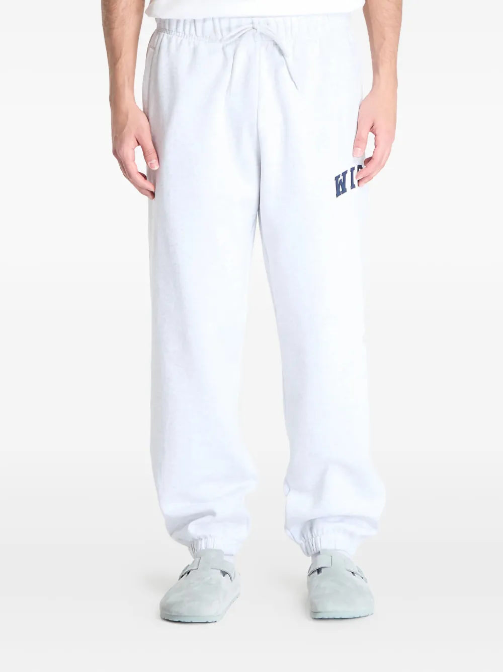 Carhartt WIP logo-patch track pants | White | Image 1
