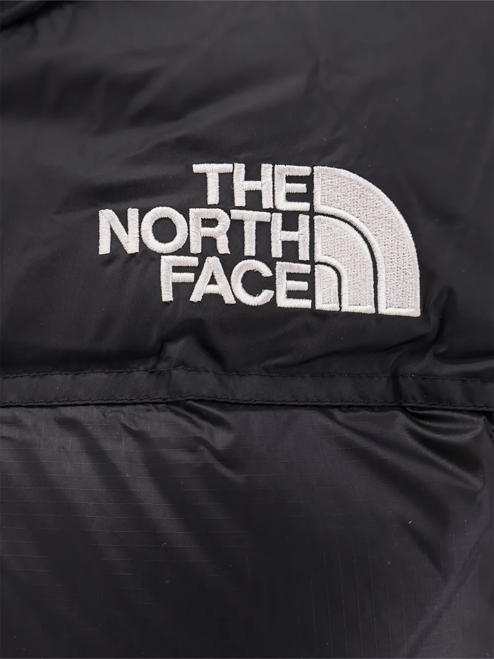 The North Face Donsjack met geborduurd logo Zwart