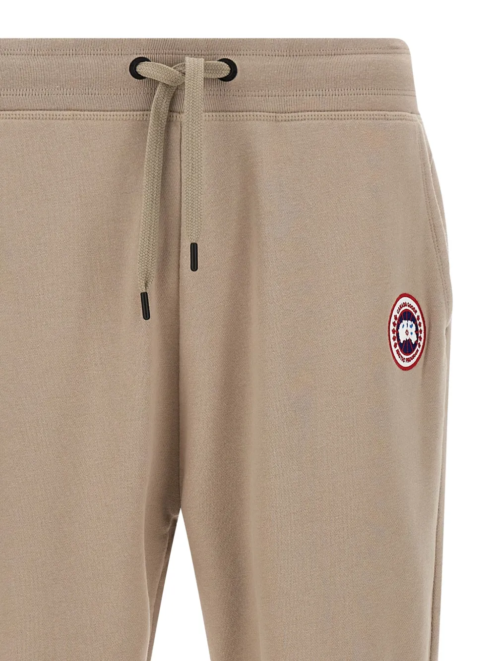 Canada Goose logo-patch drawstring joggers Beige