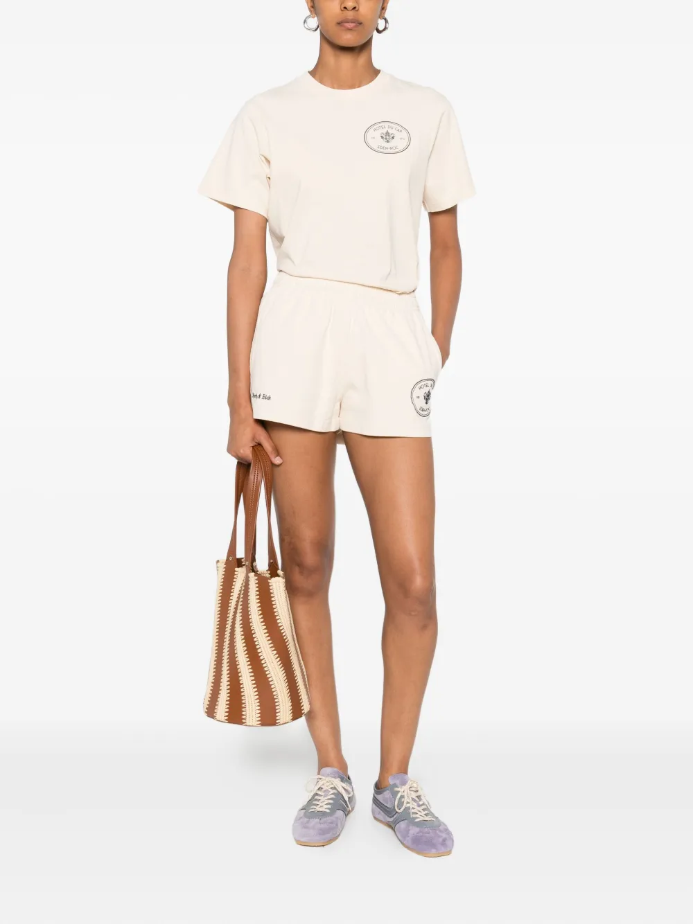 Sporty & Rich Eden Roc Hotel T-shirt met grafische print Beige