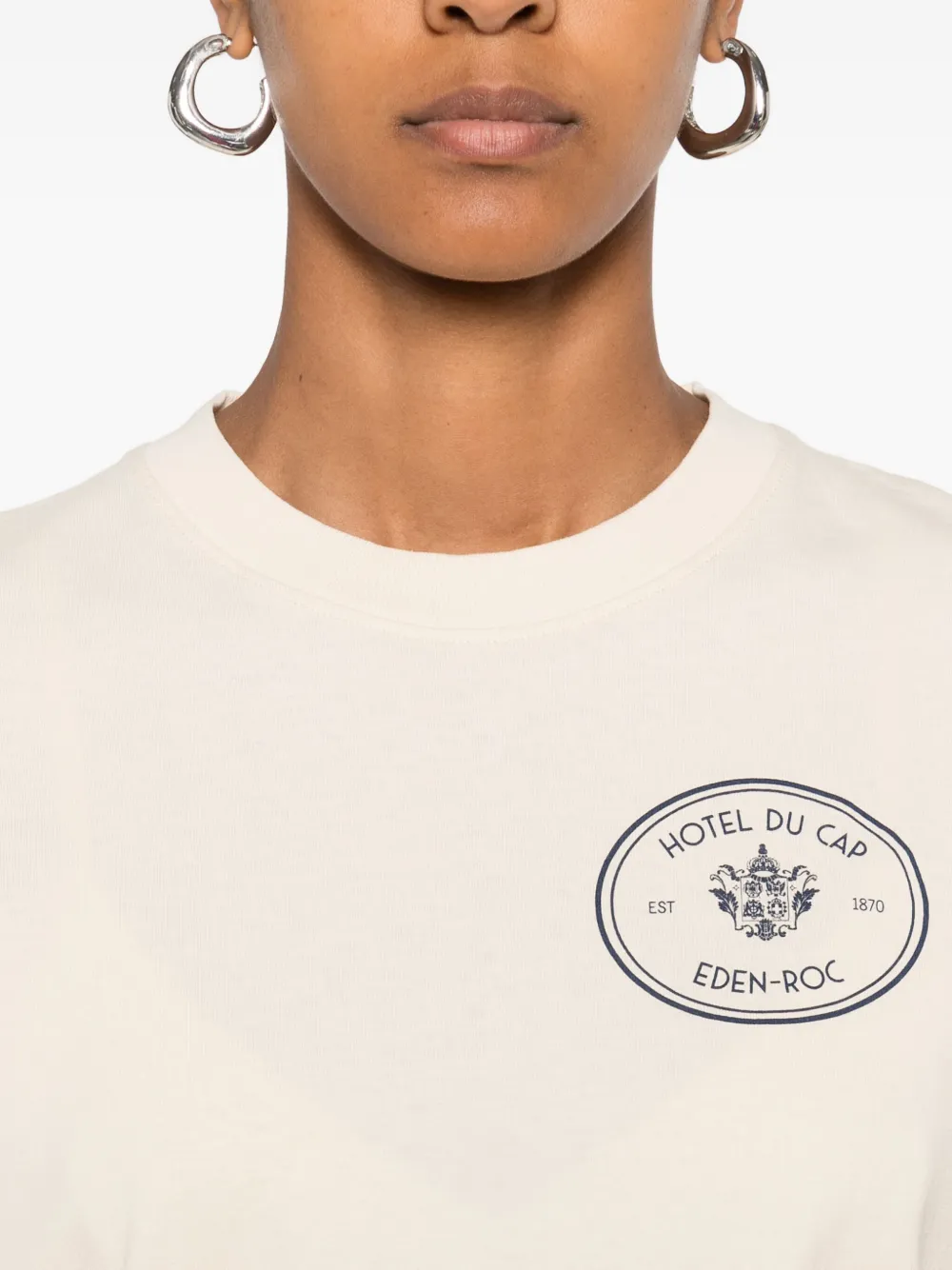 Sporty & Rich Eden Roc Hotel T-shirt met grafische print Beige
