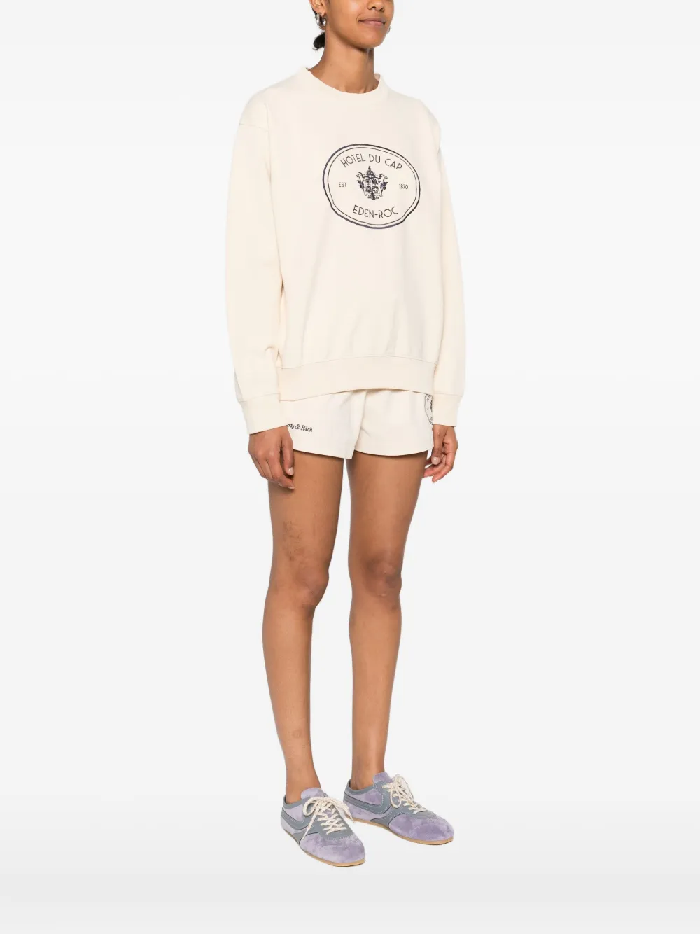 Sporty & Rich Sweater met wapenschildprint Beige