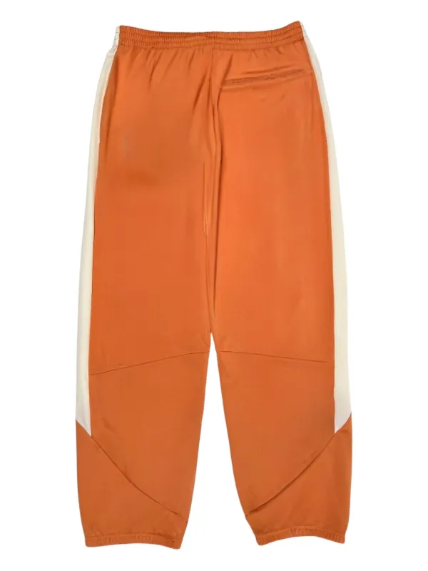 Sinclair Tech Logo Panelled Track Pants | Orange | FARFETCH